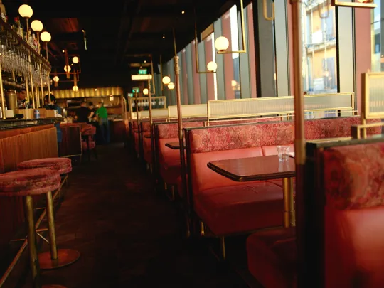Booths at Ryleighs Rooftop Steakhouse Restaurant at The Dean Docklands