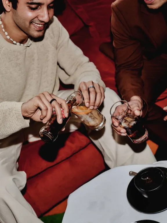 Friends enjoying drinks in The Dean hotels for Christmas