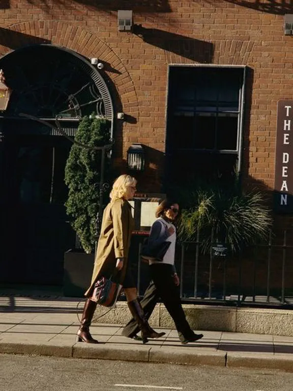Two friends walking outside the Dean Dublin Centre