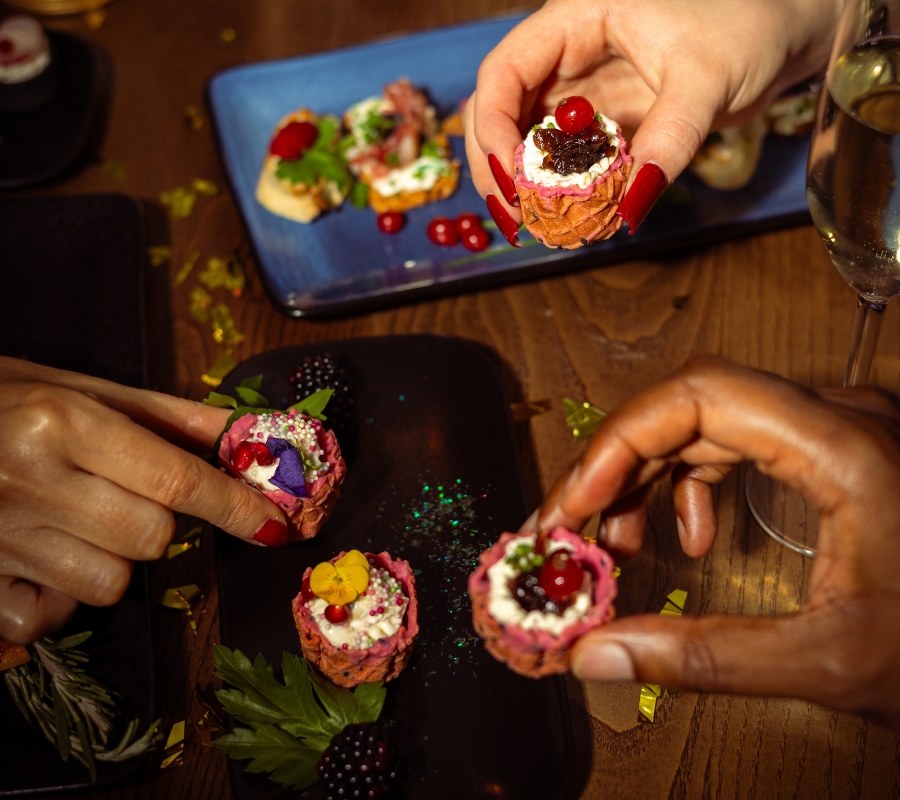 Friends enjoying canapes in The Dean hotels for Christmas