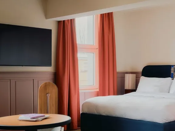 Bed in The Corner Suite at The Dean Berlin