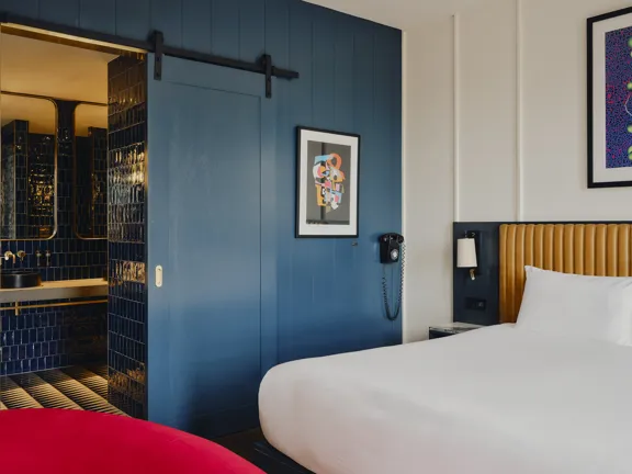 Side View of Bed in The Studio Suite