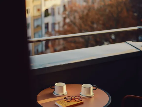 Coffee on the balcony in The Large with Balcony room in The Dean Berlin