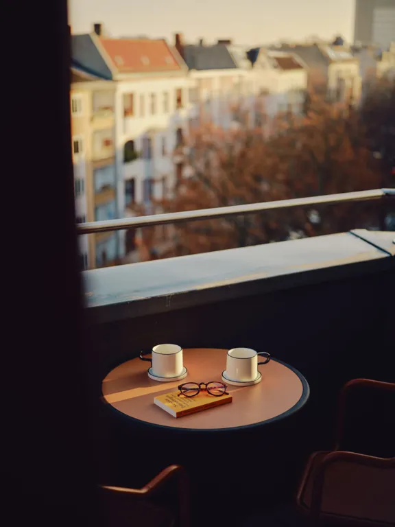 Coffee on the balcony in The Large with Balcony room in The Dean Berlin