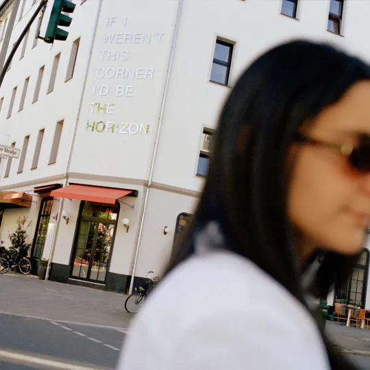 Woman stanind outside The Dean Berlin