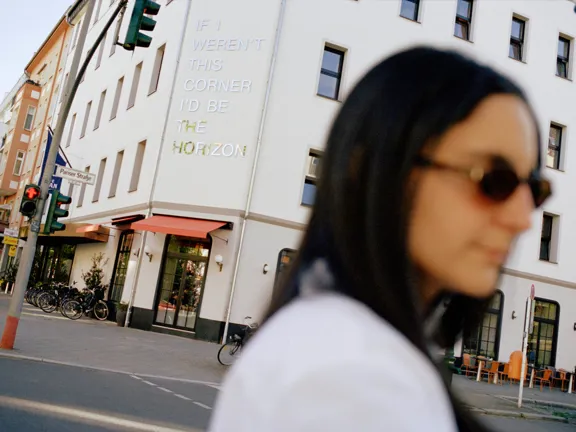 Woman stanind outside The Dean Berlin