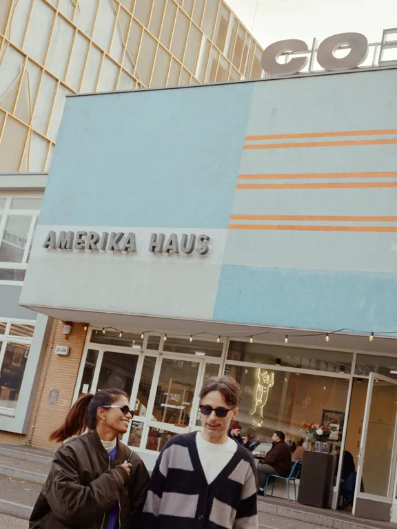 Amerika Haus with couple outside near the Dean Berlin