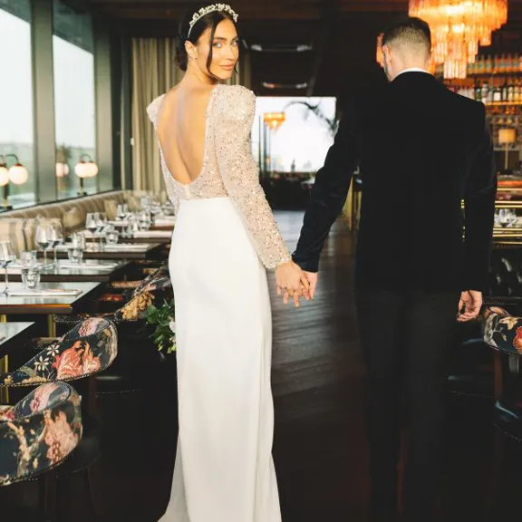 Wedding couple in Sophies Rooftop Restaurant at the Dean Galway