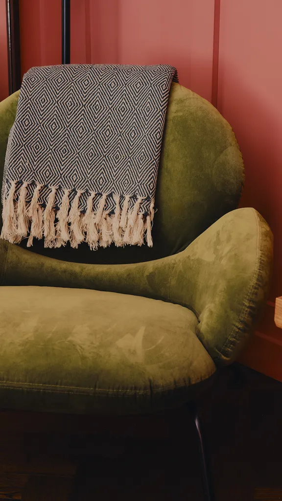Teal Archair in Corner Large Room