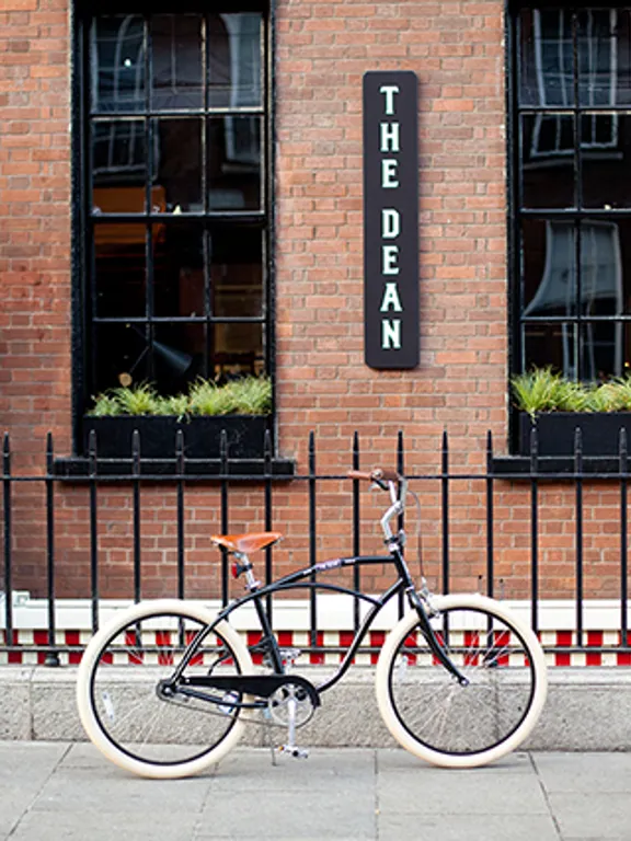 Bicycle against the exterior of the Dean Dublin Centre
