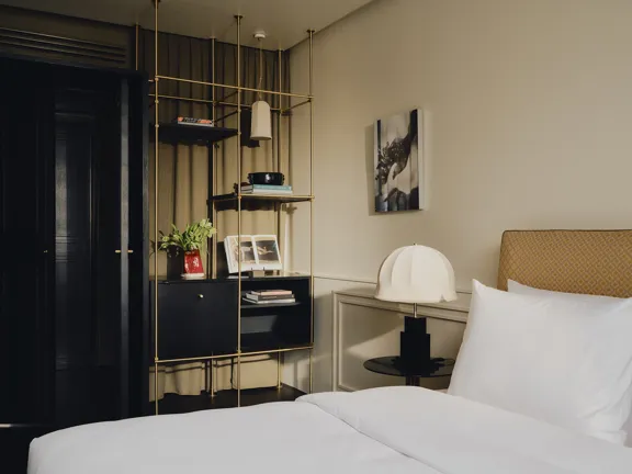 Bed area in The Superior Suites at The Dean Munich