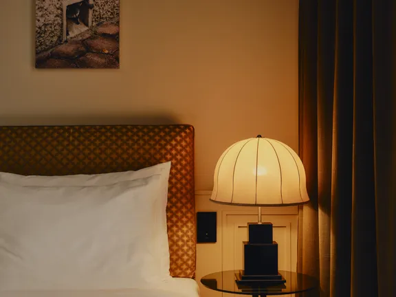 Close up bedroom shot of the lamps in the double rooms at The Dean Munich